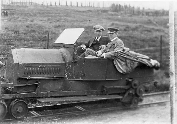 Arthur Whitten Brown (right) and John Alcock in a railcar