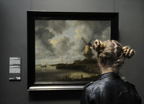 Girl looking at The Windmill at Wijk bij Duurstede 1670, by