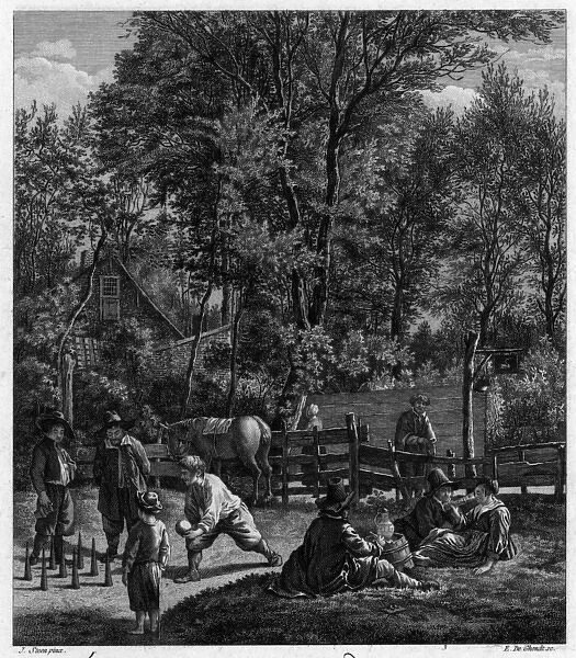 People playing skittles in a field