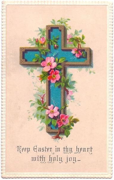 Pink flowers on a blue cross on an Easter card