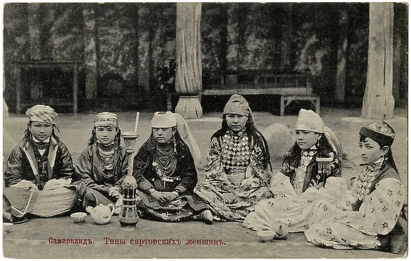Samarkand, Uzbekistan - Children seated with Chillum and tea