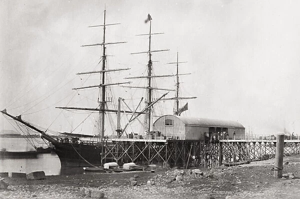 Vintage 19th century photograph: ship at iron wharf, scaffolding, Rangoon, Burma, Yangon