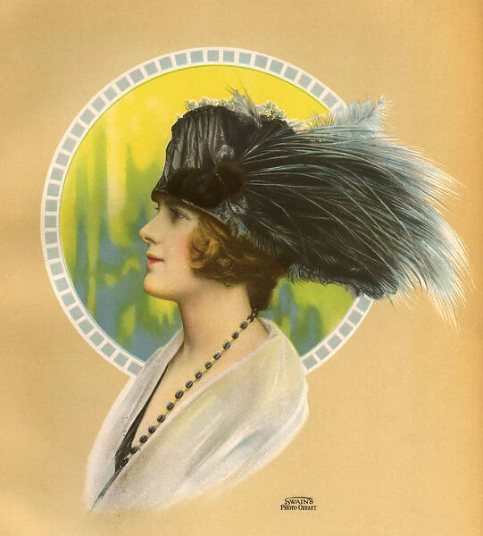 Women wearing an ostrich feather hat 1923