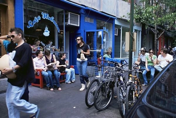 Young people outside a cafe in the Nolita neighbourhood