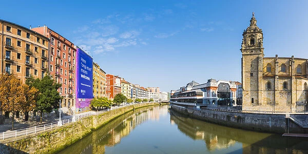 Spain, Basque Country, Bilbao. Nervion river and the Mercado de la Ribera market