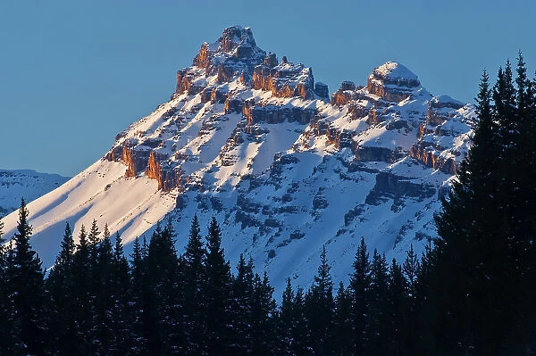 Sunrise on Dolomite Peak of the Canadian Rocky Mountains. Icefields Parkway Alberta Canada