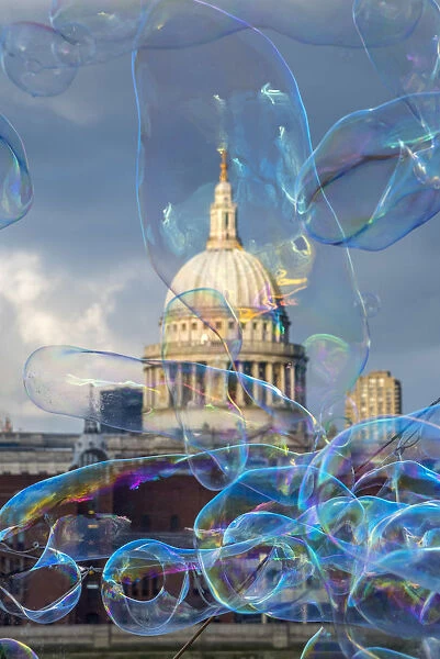 UK, England, London, City of London, St. Pauls Cathedral and street entertainer s