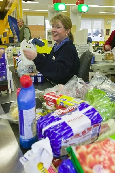 Food on a cash out conveyor belt in a Tesco supermarket in Carlisle UK