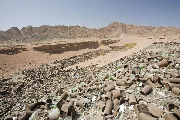Tin cans discarded in the mountains of the Sinai desert near Dahab in Egypt. Temperatures have already risen by 0. 7 degrees celcius in the last 100 years making an already hot and dry area even more so. This desert area is likely to spread across