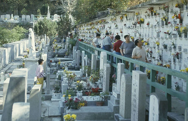 10023433. HONG KONG Festival People visiting Qing Ming Festival graveyard