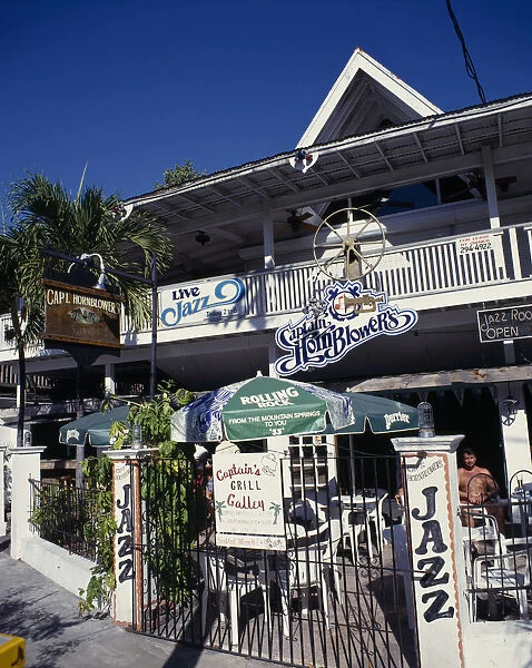 10027778. USA Florida Key West Captain Hornblowers Grill Room with balcony and iron gates