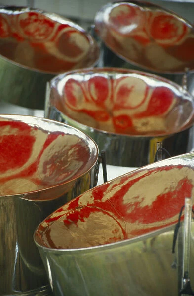 10032775. WEST INDIES Tobago Detail of steel band drums with red reflections