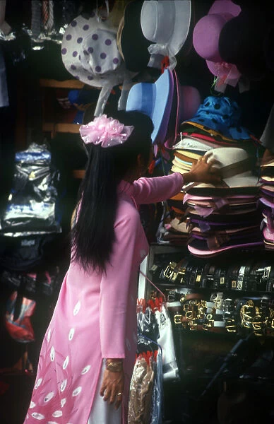 10066781. VIETNAM Ho Chi Minh City Central Market Woman Buying Hat Saigon