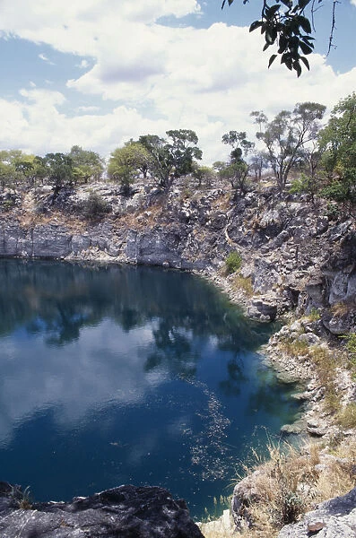 10076876. NAMIBIA Damara Lake Otjikoto Sink Hole formed
