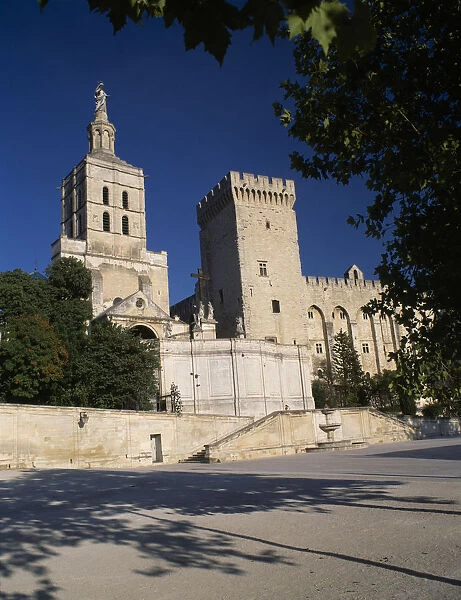 10086463. FRANCE Avignon Papal Palace Tall towers with crenelations