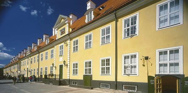 10128069. LATVIA Riga Swedish Gate. Row of bright yellow terraced houses