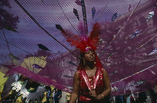 20029163. ENGLAND London Notting Hill Carnival dancer in pink
