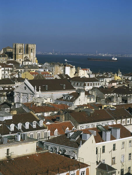 20032327. PORTUGAL Lisbon Bairro Alto View over city rooftops toward The Se Cathedral