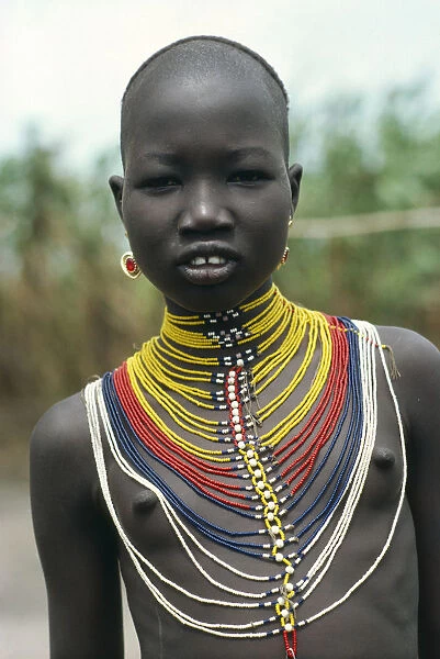 20035946. SUDAN Jewellery Young Dinka girl wearing multi stranded necklace made