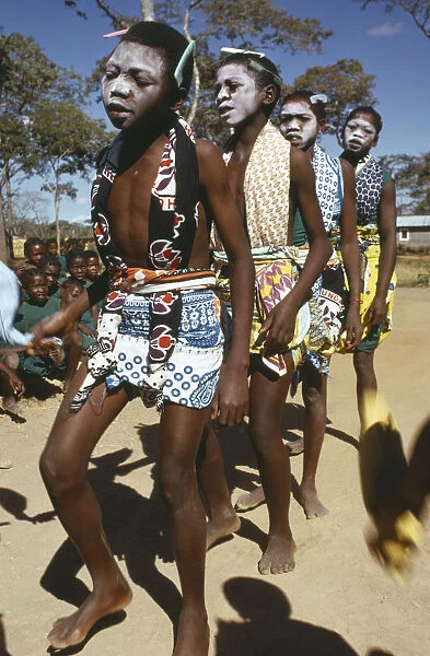 20039492. TANZANIA Festivals Makonde girls wearing ritual face whitening