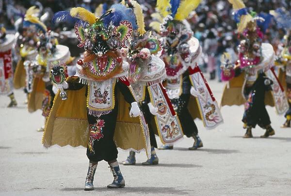 20041338. BOLIVIA Oruro Carnival masqueraders in colourful animal costumes Colorful