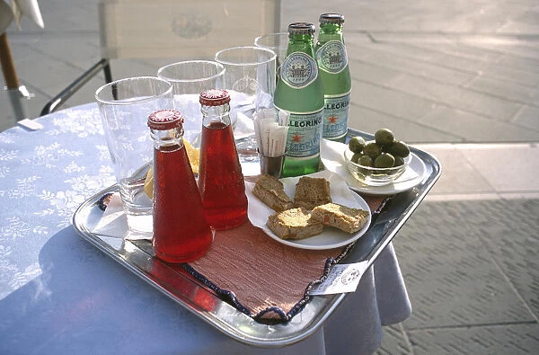 20045636. ITALY Trieste Piazza Unita Tray on a small round lace clothed table with glasses