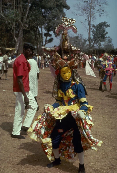 20052212. sierra leone, festival, kaka devil secret society masked dancer