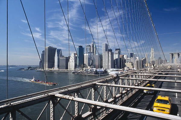 20056978. USA New York New York City View of Manhattan skyline from Brooklyn Bridge