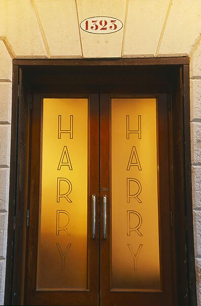 20070298. ITALY Veneto Venice Door of Harrys Bar with name etched on the frosted glass