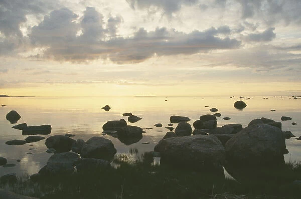 20071839. ESTONIA Baltic Coast Sunset over rocks