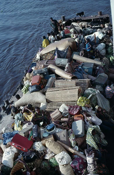 20078652. CONGO Transport Heavily loaded river boat on the River Congo