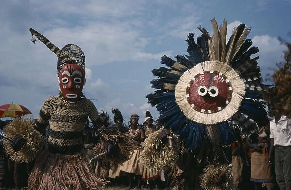 20078663. CONGO Gungu Bapende tribe masked dancers at Gungu festival. Zaire