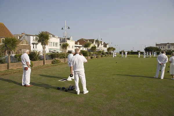 20087366. ENGLAND West Sussex Bognor Regis Men playing a game of bowls on green