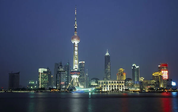 20087547. CHINA Shanghai Pudong at night with illuminated skyscrapers