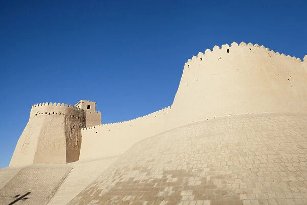 Akshi Bobo, a tower of Kunya Ark, on left, and outer wall of Ichan Kala, Khiva