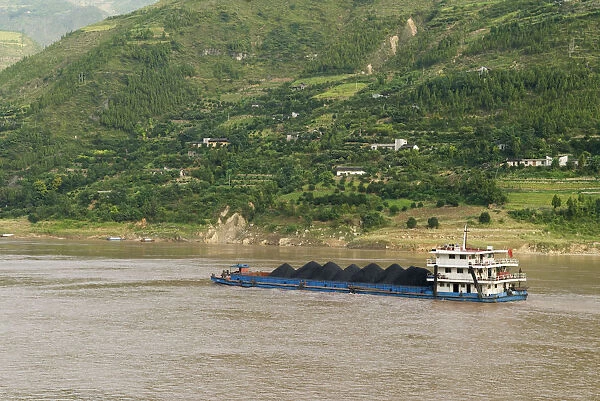 China, Chongqing, Wushan Coal barge on the Yangtze River near Wushan