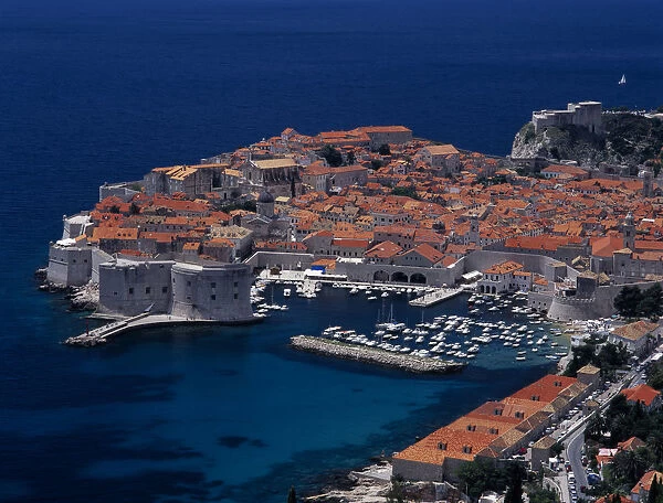 CROATIA, Dalmatia, Dubrovnik Elevated view over the Old City Harbour with fortified