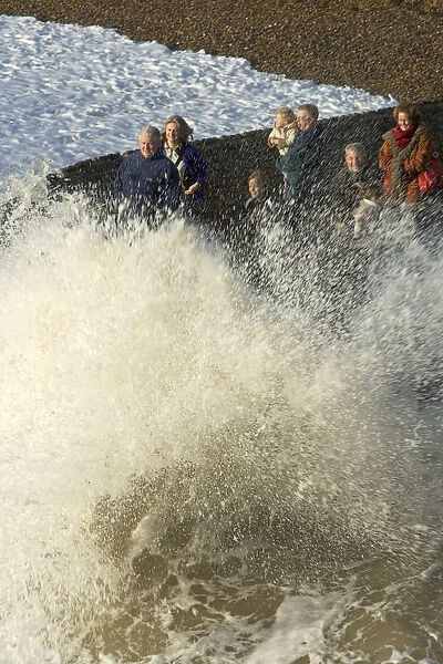 England, East Sussex, Brighton, Waves crashing against breakwater