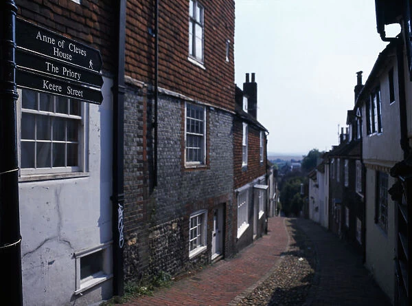 ENGLAND East Sussex Lewes View down cobbled old street with cottage housing