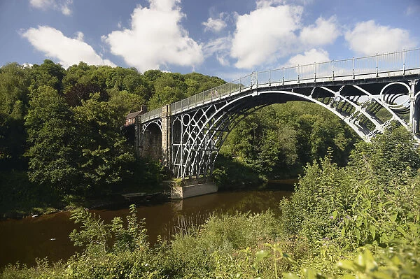 England, Shropshire, Ironbridge, View of the grade 1 listed Cast Iron Bridge across the river Severn
