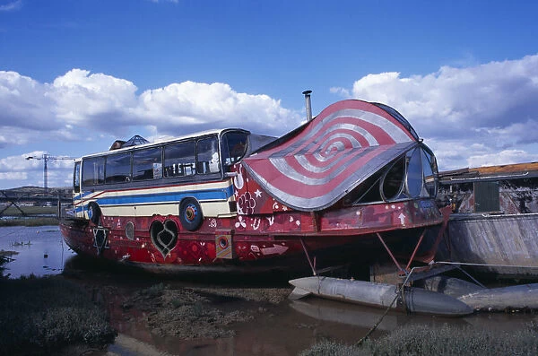 ENGLAND West Sussex Shoreham by Sea Colourful houseboat fabricated with various bus