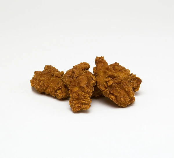 Food, Cooked, Poultry, Battered spicey chicken wings on a white background