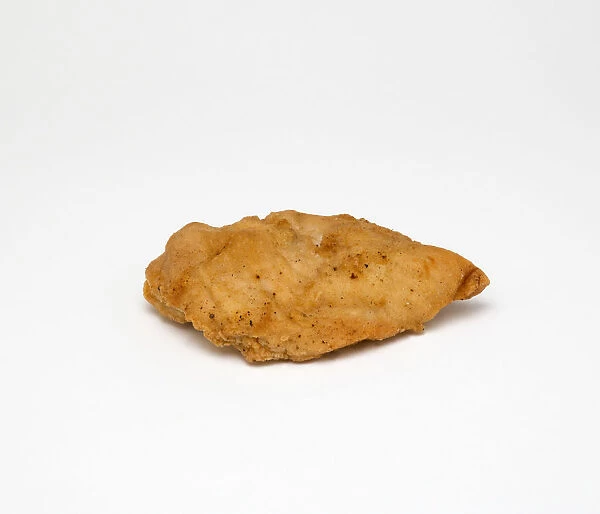 Food, Cooked, Poultry, Single battered chicken breast fillet on a white background