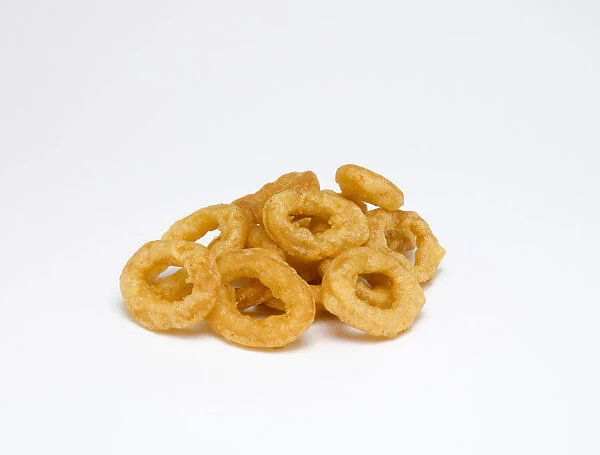 Food, Cooked, Seafood, Fried battered calamari squid rings on a white background