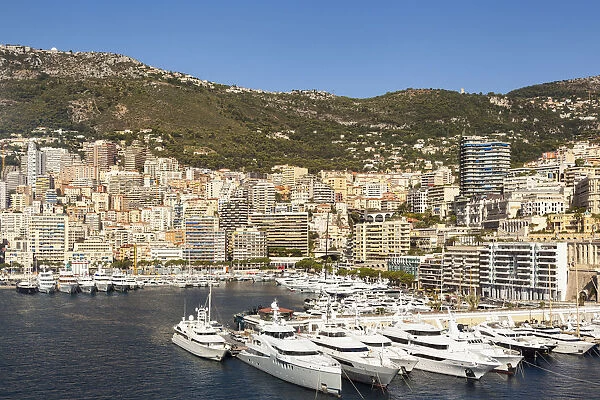 France, Monaco, Yachts moored in Monaco Harbour, Port Hercule, and La Condamine