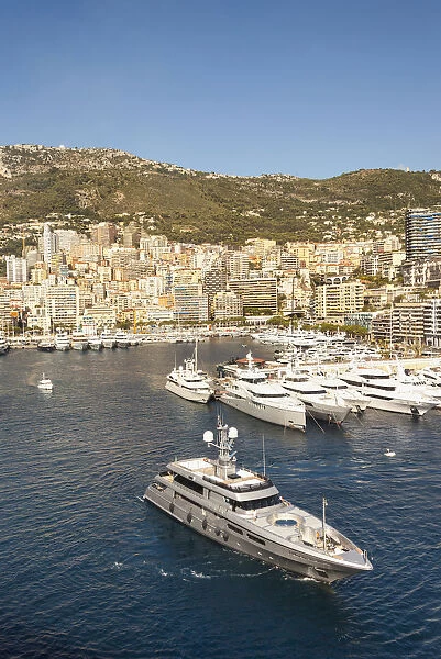 France, Monaco, Yachts moored in Monaco Harbour, Port Hercule, and La Condamine