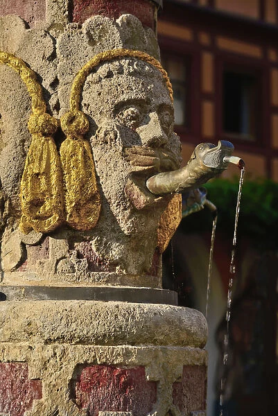 Germany, Bavaria, Rothenburg ob der Tauber, Fountain detail on Herrngasse