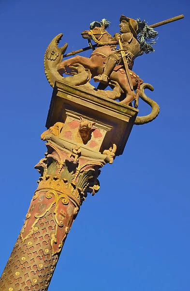 Germany, Bavaria, Rothenburg ob der Tauber, Marktplatz, St Georges Fountain with figure on horseback on a pedestal