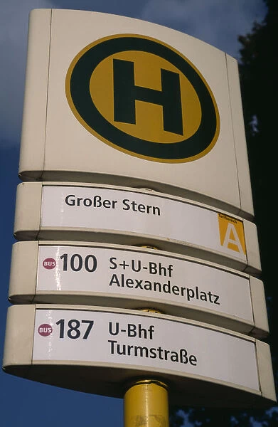 GERMANY, Berlin Bus and tram stop sign, green H within yellow circle stands for
