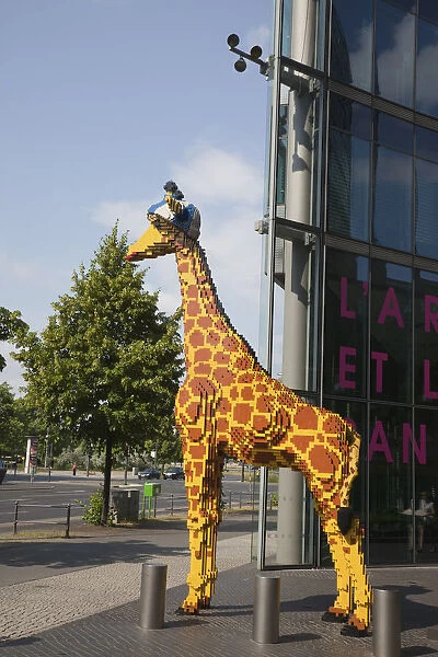 Germany, Berlin, Mitte, Potsdamer Platz, Model of Giraffe outside the Legoland Discovery